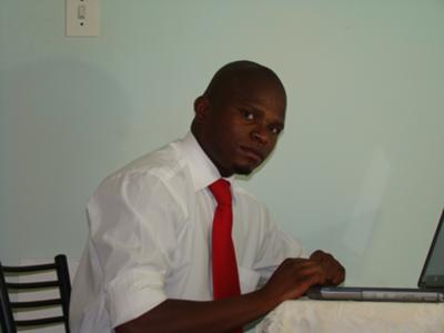 Hard at work: Mr. Justice Molafo, Senior Communication Manager.